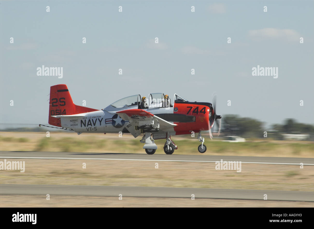 A T-28 Trojan aircraft at an air show, landing. Stock Photo