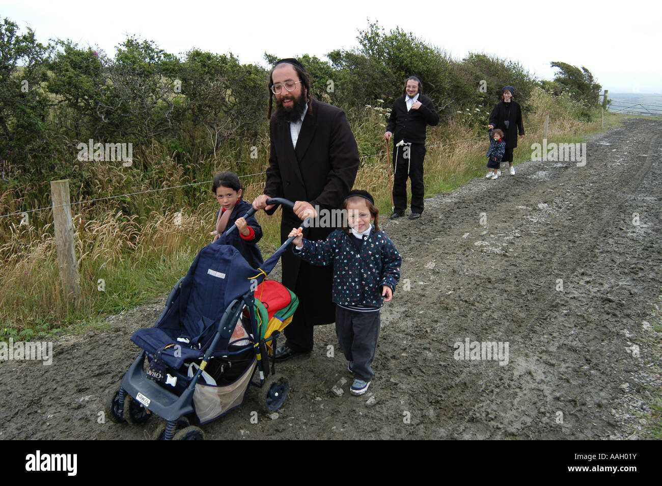 Family of ultra orthodox hassidic jews on holiday in Aberystwyth out for a stroll. Wales UK Stock Photo