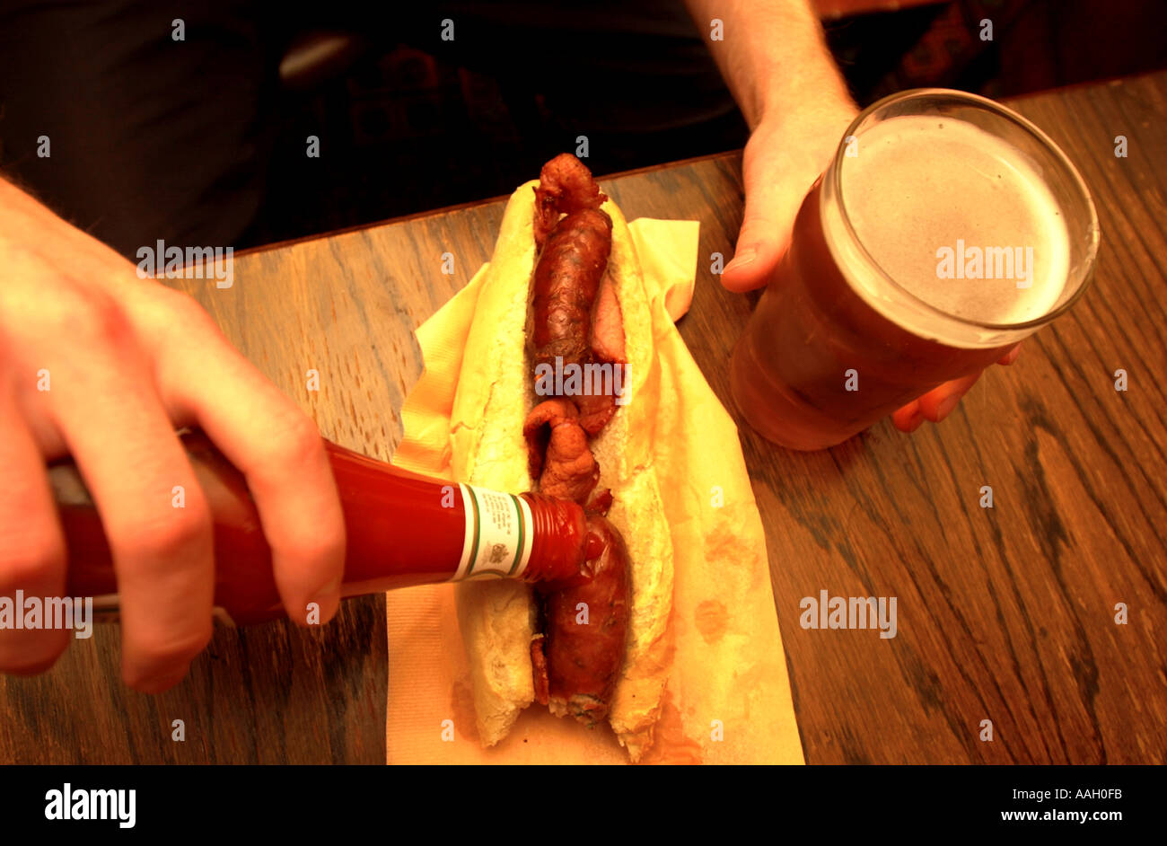 A PUB BACON AND SAUSAGE BAGUETTE Stock Photo