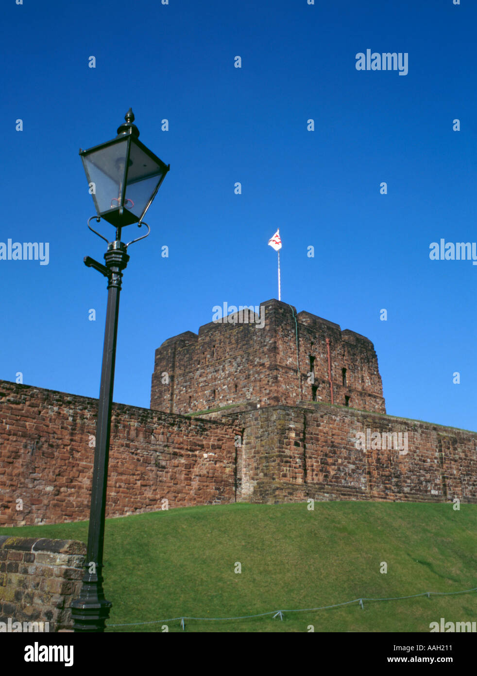 Norman keep and red sandstone walls of Carlisle Castle, Carlisle, Cumbria, England, UK. Stock Photo