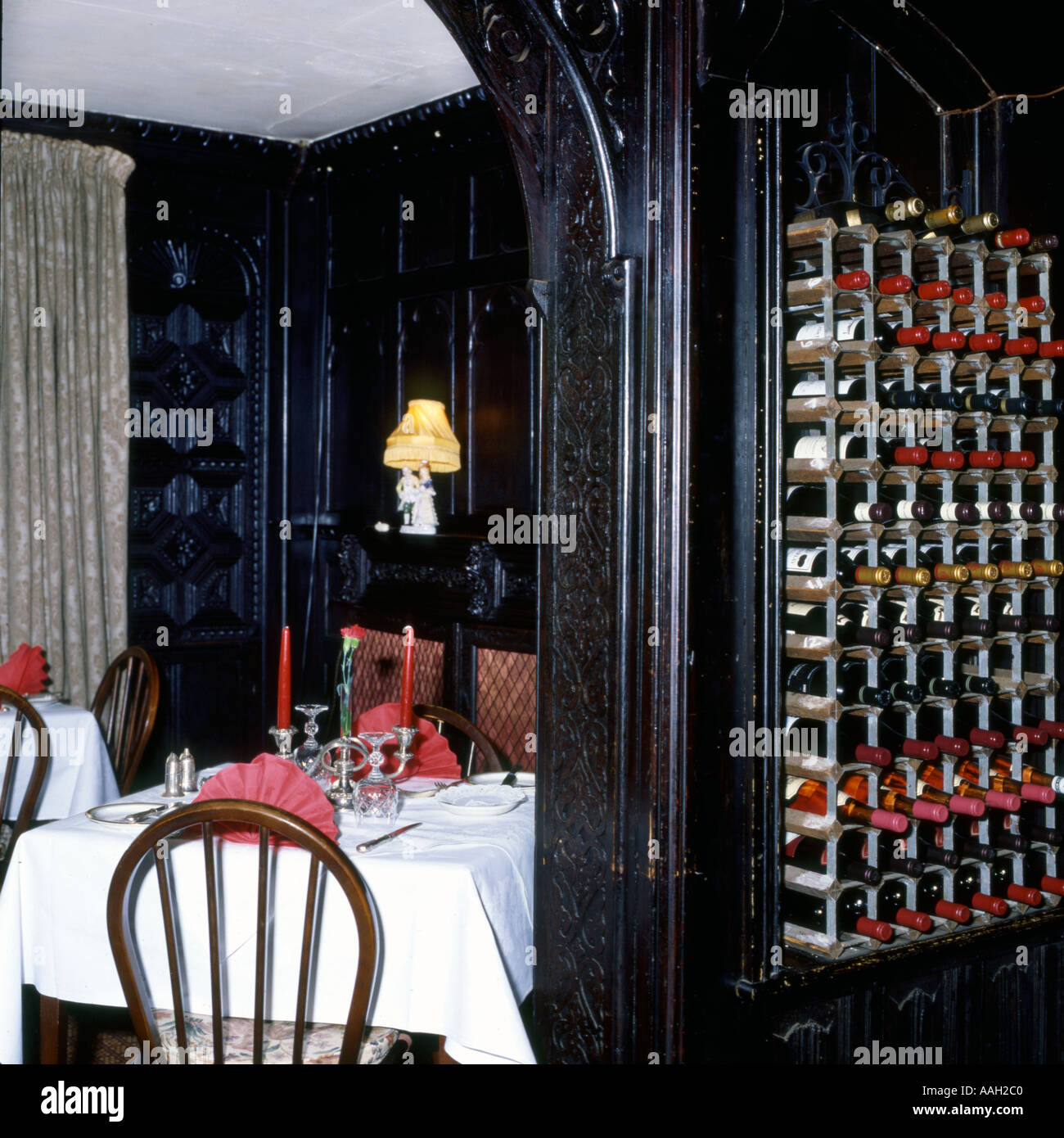 Dinner Table and Wine Racks Stock Photo