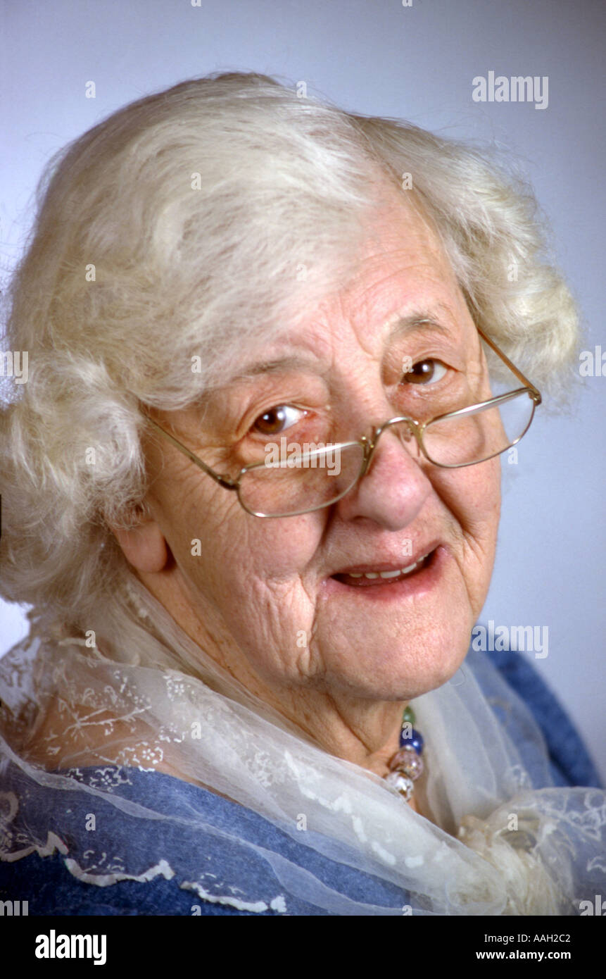 Smiling elderly lady hi-res stock photography and images - Alamy
