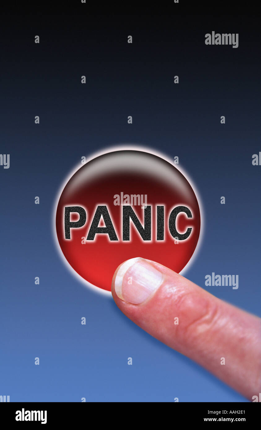 finger pushing the panic button Stock Photo