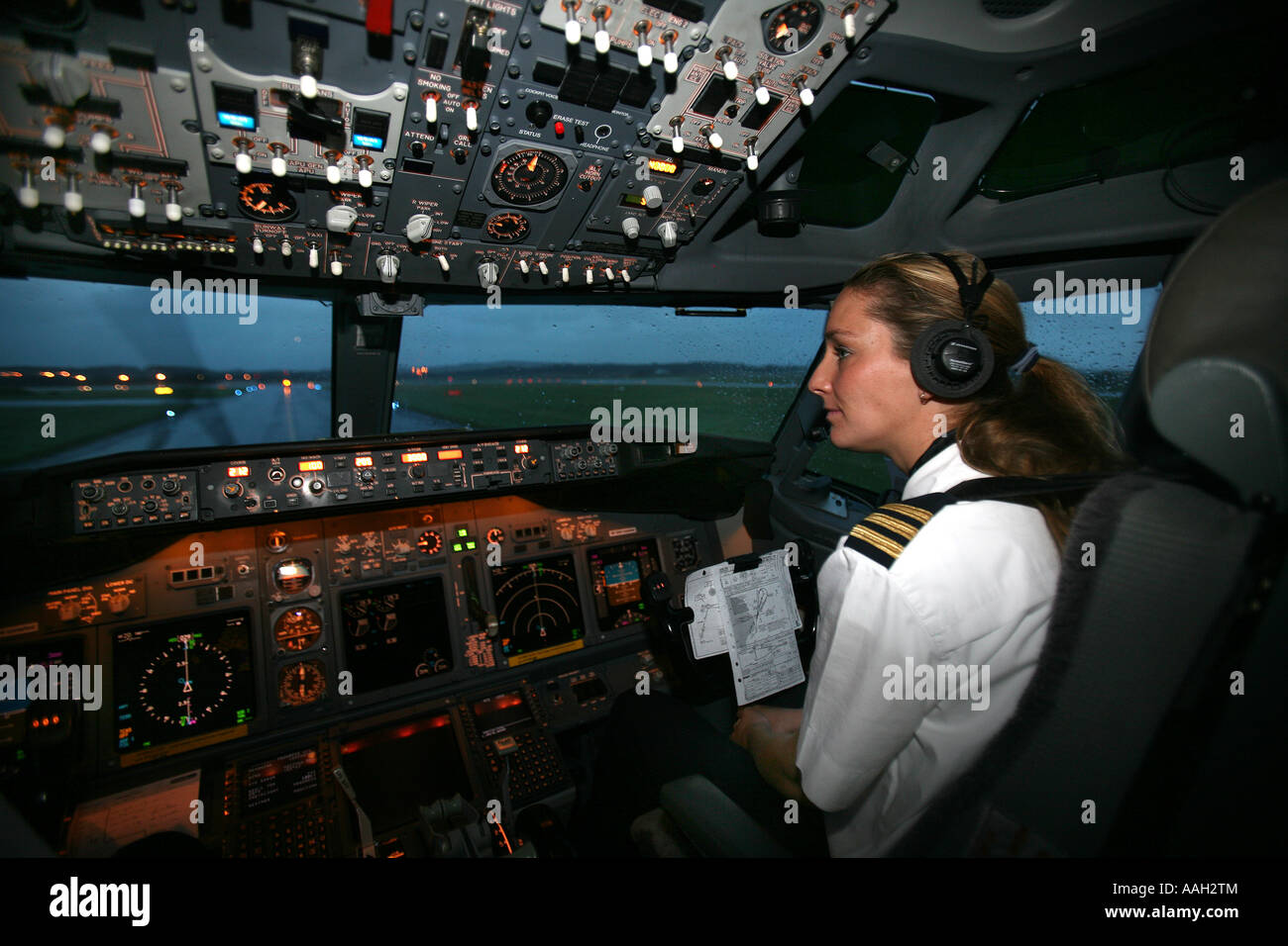 Pilot and co pilot working in a Boeing 737 editorial use only no negative publicity Stock Photo