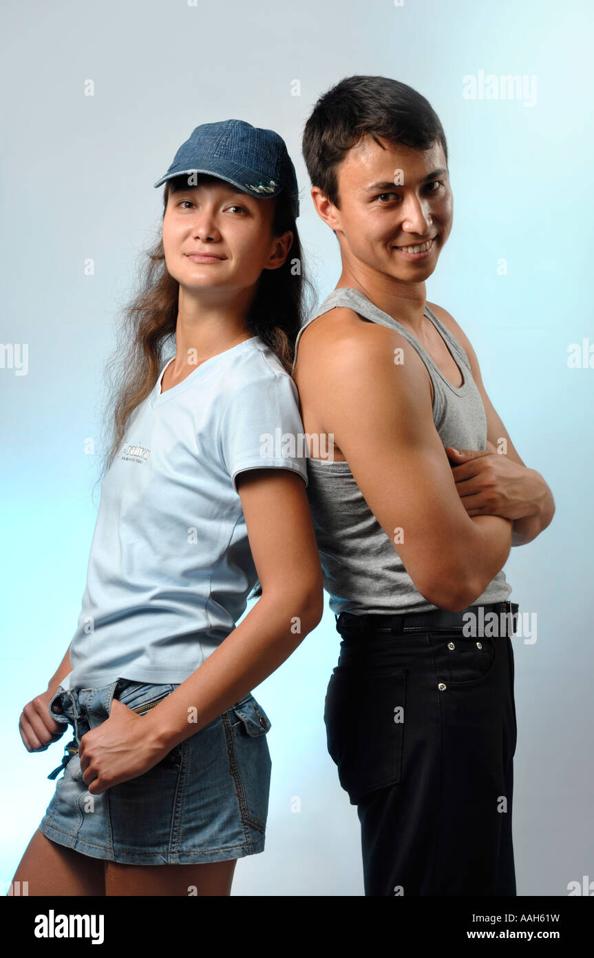 Young smiling asian woman and a man Stock Photo - Alamy