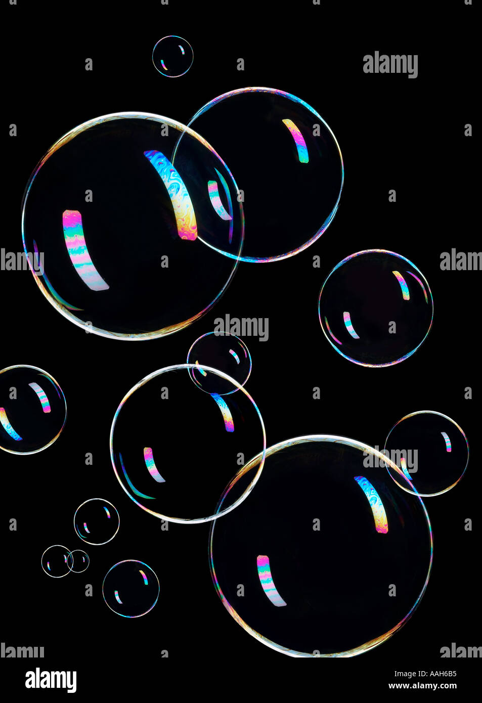 Floating Soap Bubbles With Black Background In Studio Stock Photo