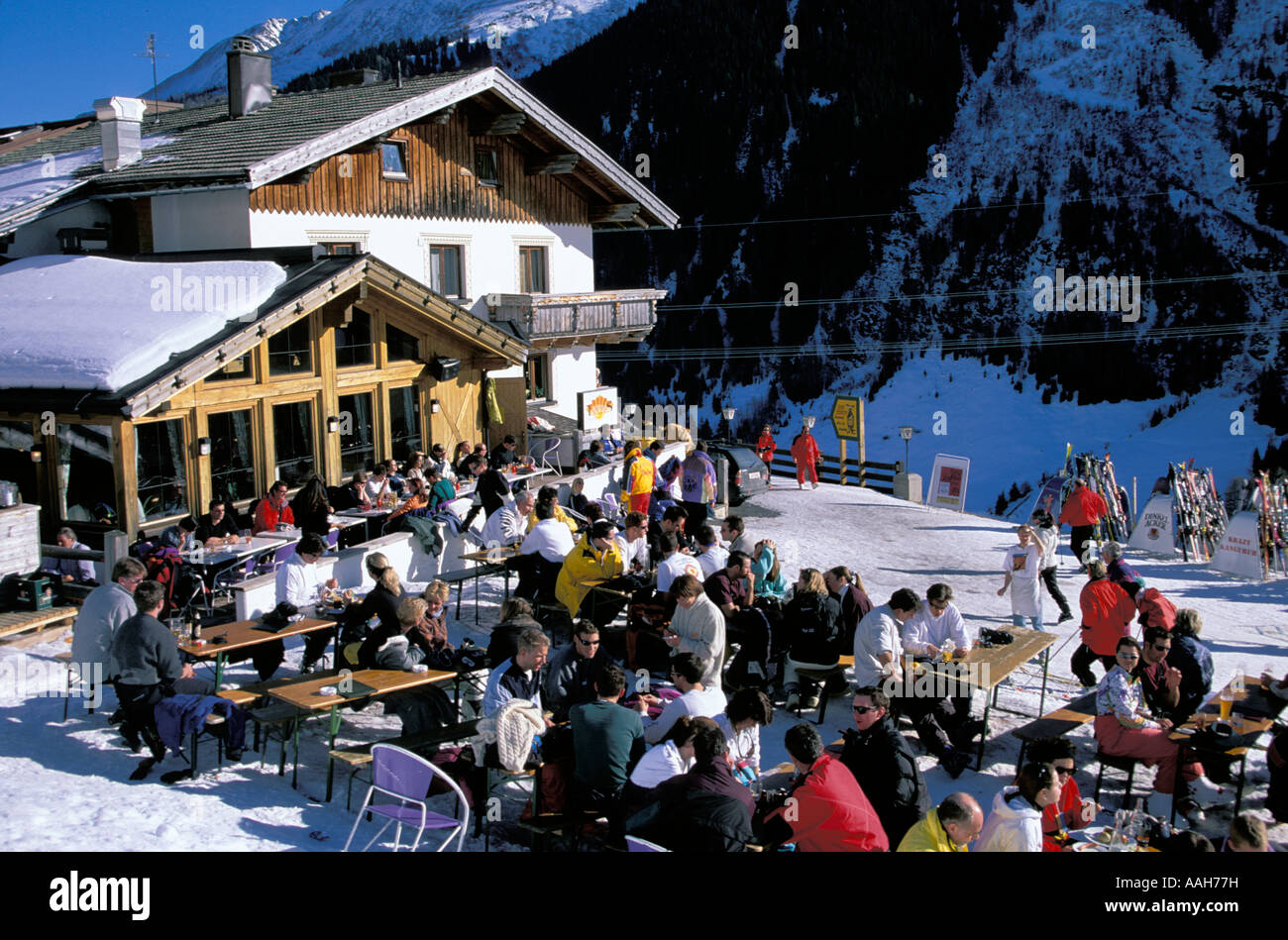 People sitting in beer garden of a ski hut St Anton Tyrol Austria Stock