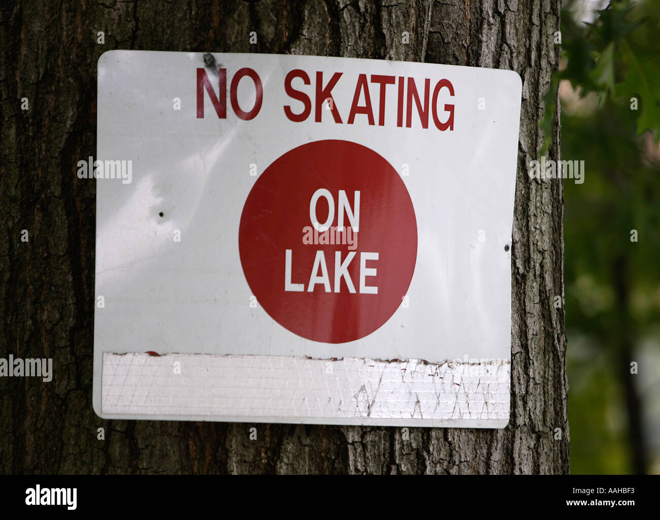 Warning sign near a lake Stock Photo