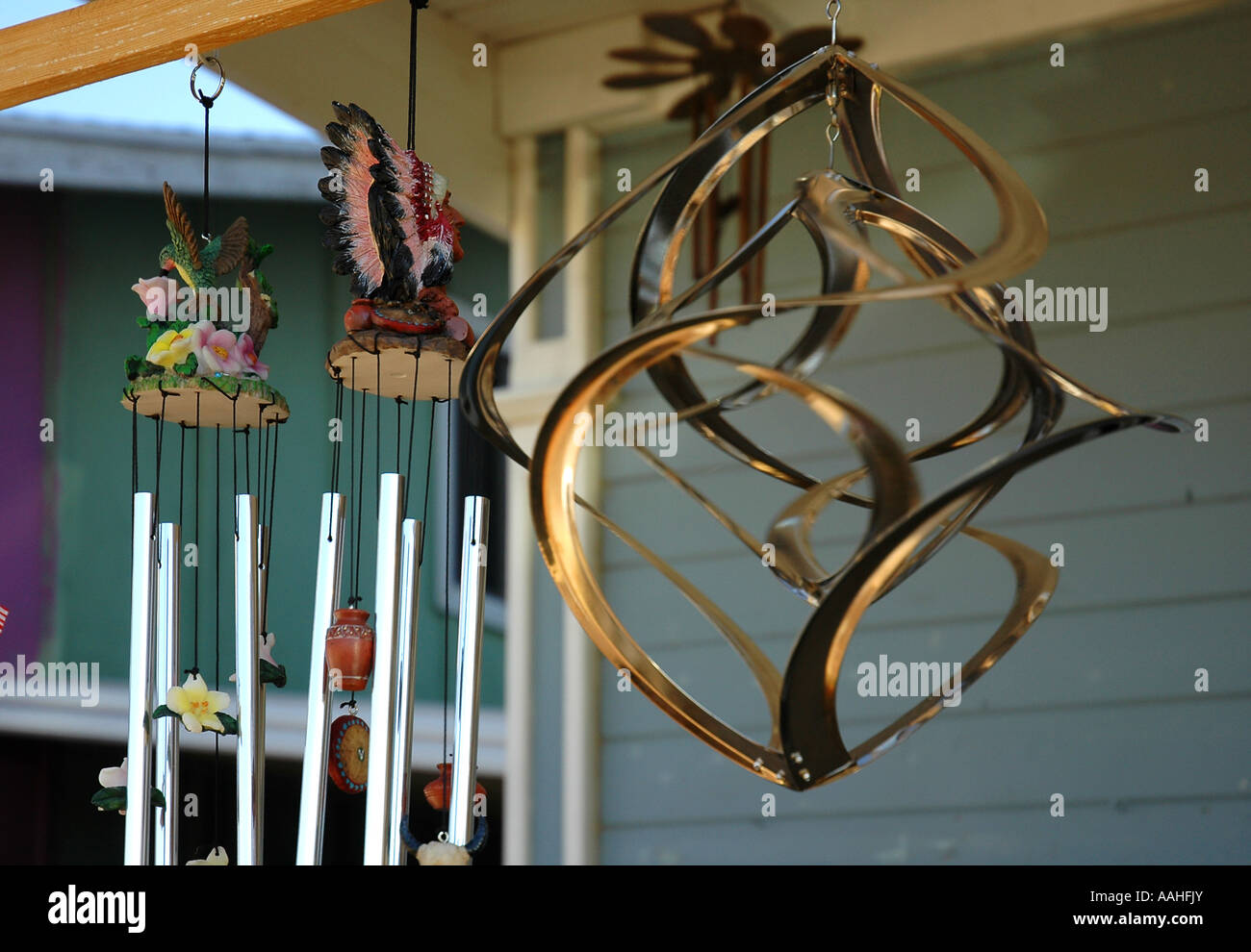 Copper wind chime spinner hanging on a front porch full of relaxing
