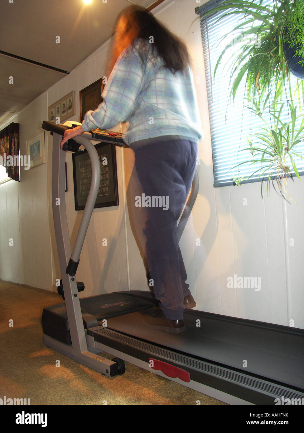 Walking on Treadmill Stock Photo Alamy