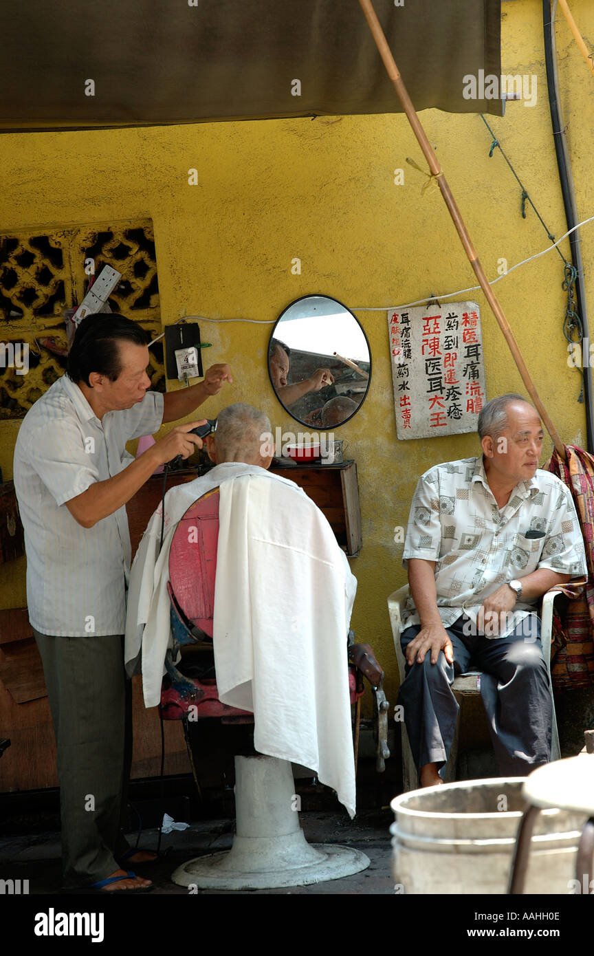 Open air barber shop in Petaling Street Malaysia Stock Photo Alamy