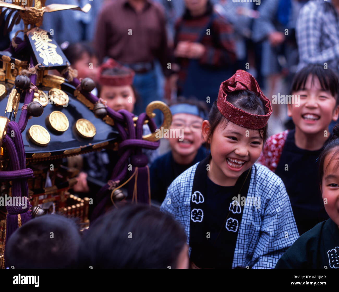 Japanese children carrying portable shrine at Tokyo's Sanja Matsuri held at Senso-ji Temple (Asakusa Kannon ) Stock Photo