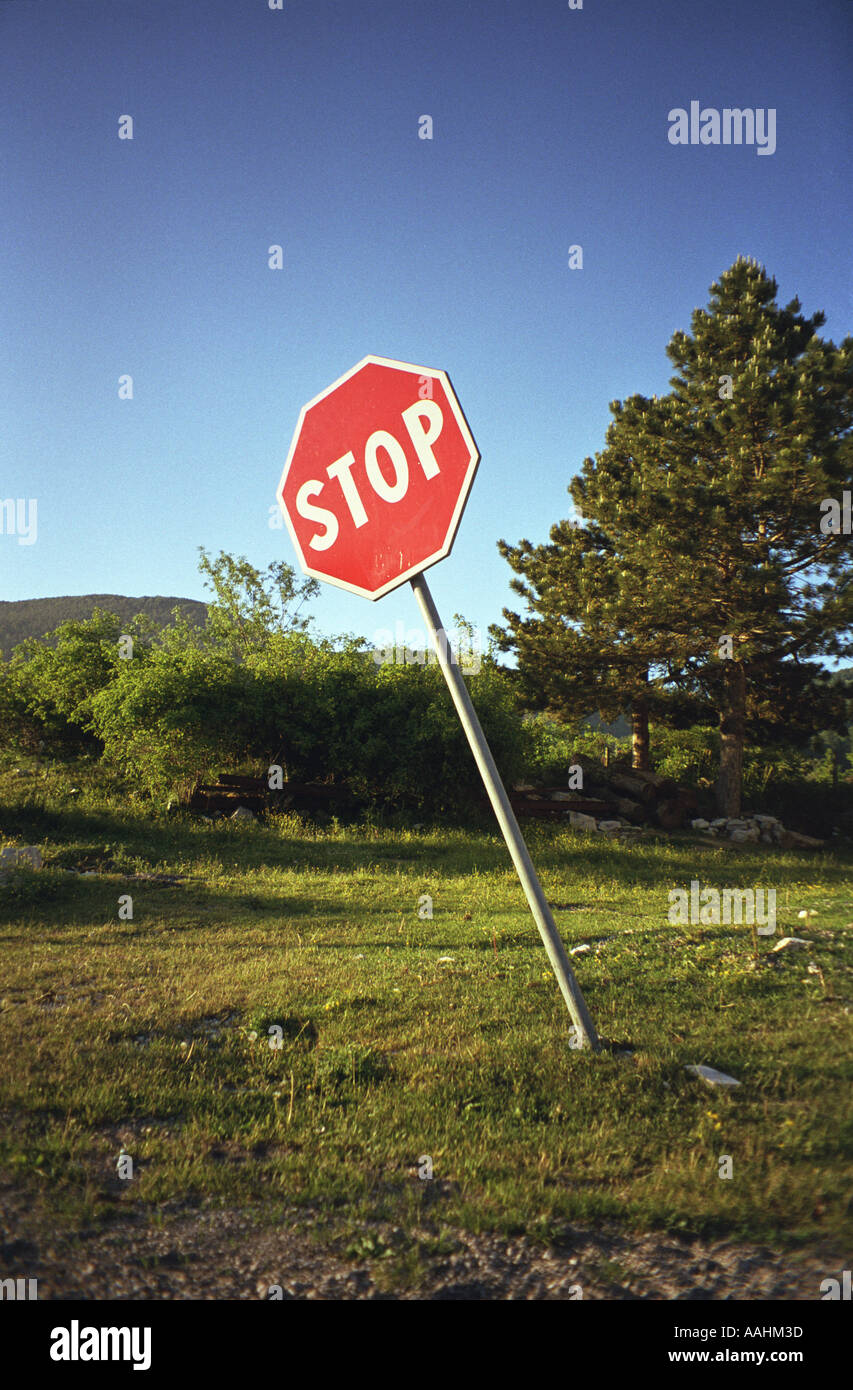 Lean Stop Sign Leaning stop sign in countryside Stock Photo - Alamy