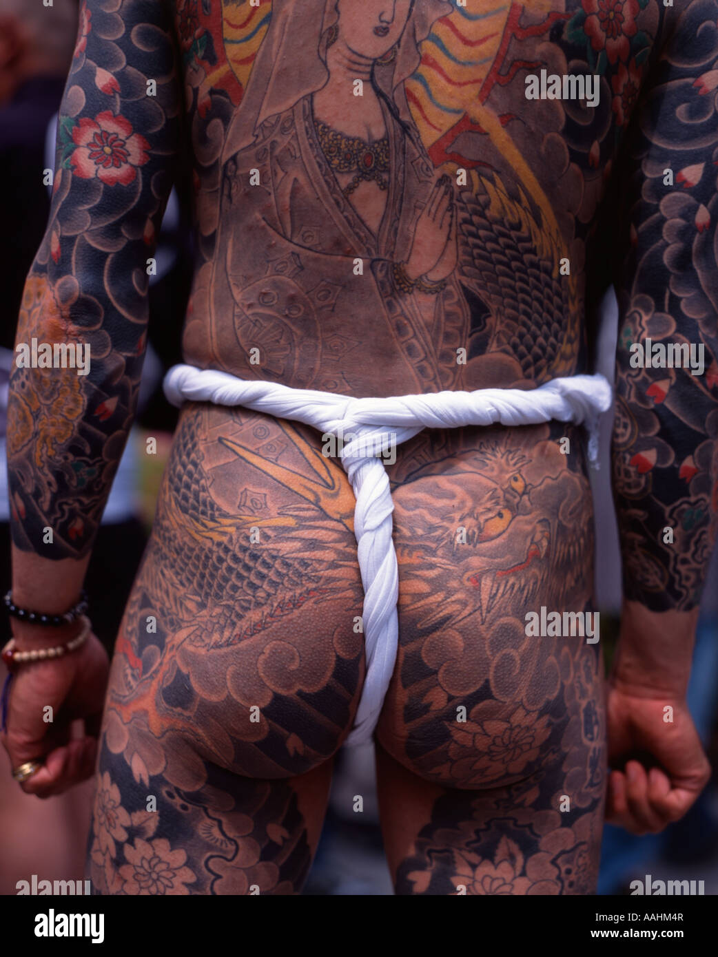 Tattoos on the back of man at Tokyo's Sanja Matsuri held at Senso-ji Temple ( Asakusa Kannon ) Stock Photo