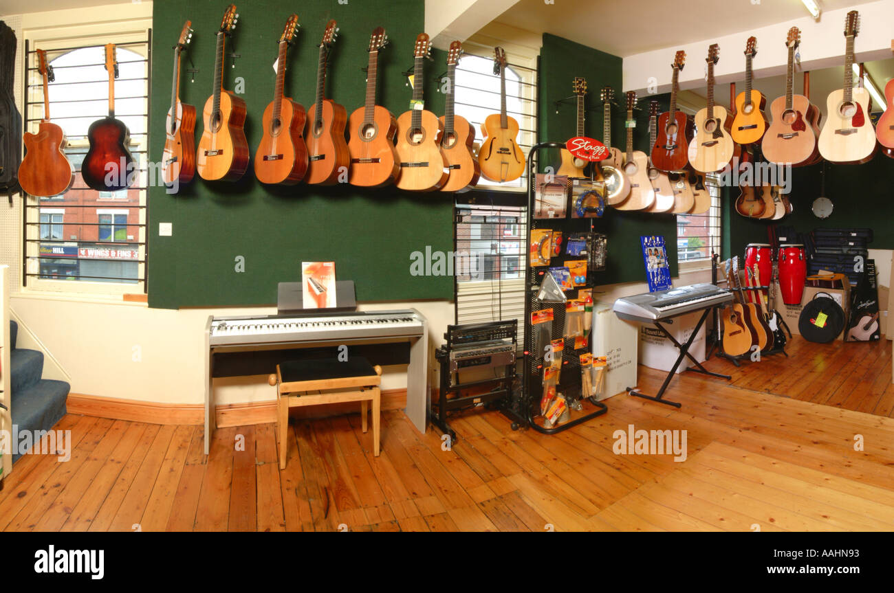 Interior music shop alligator Stockport UK Stock Photo