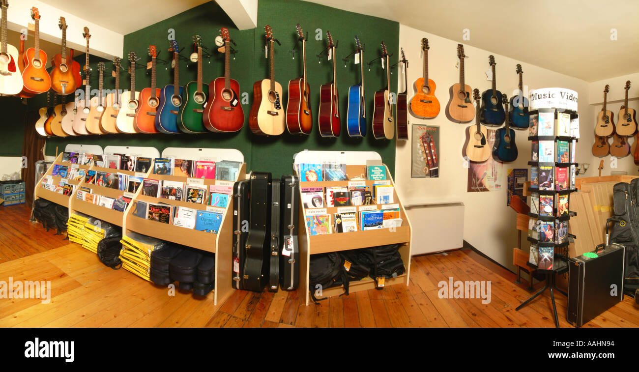 Interior music shop alligator Stockport UK Stock Photo