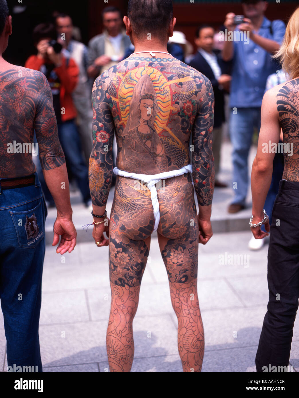 Tattoos on the back of men at Tokyo's Sanja Matsuri held at Senso-ji Temple ( Asakusa Kannon ) Stock Photo