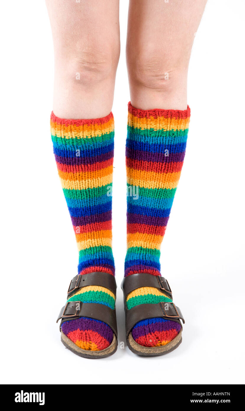 Hippy rainbow socks and sandals Stock Photo Alamy