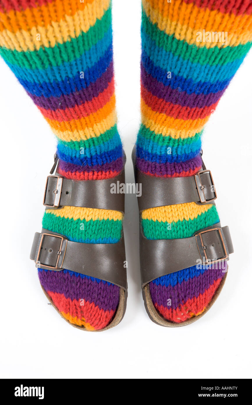 Hippy rainbow socks and sandals Stock Photo Alamy