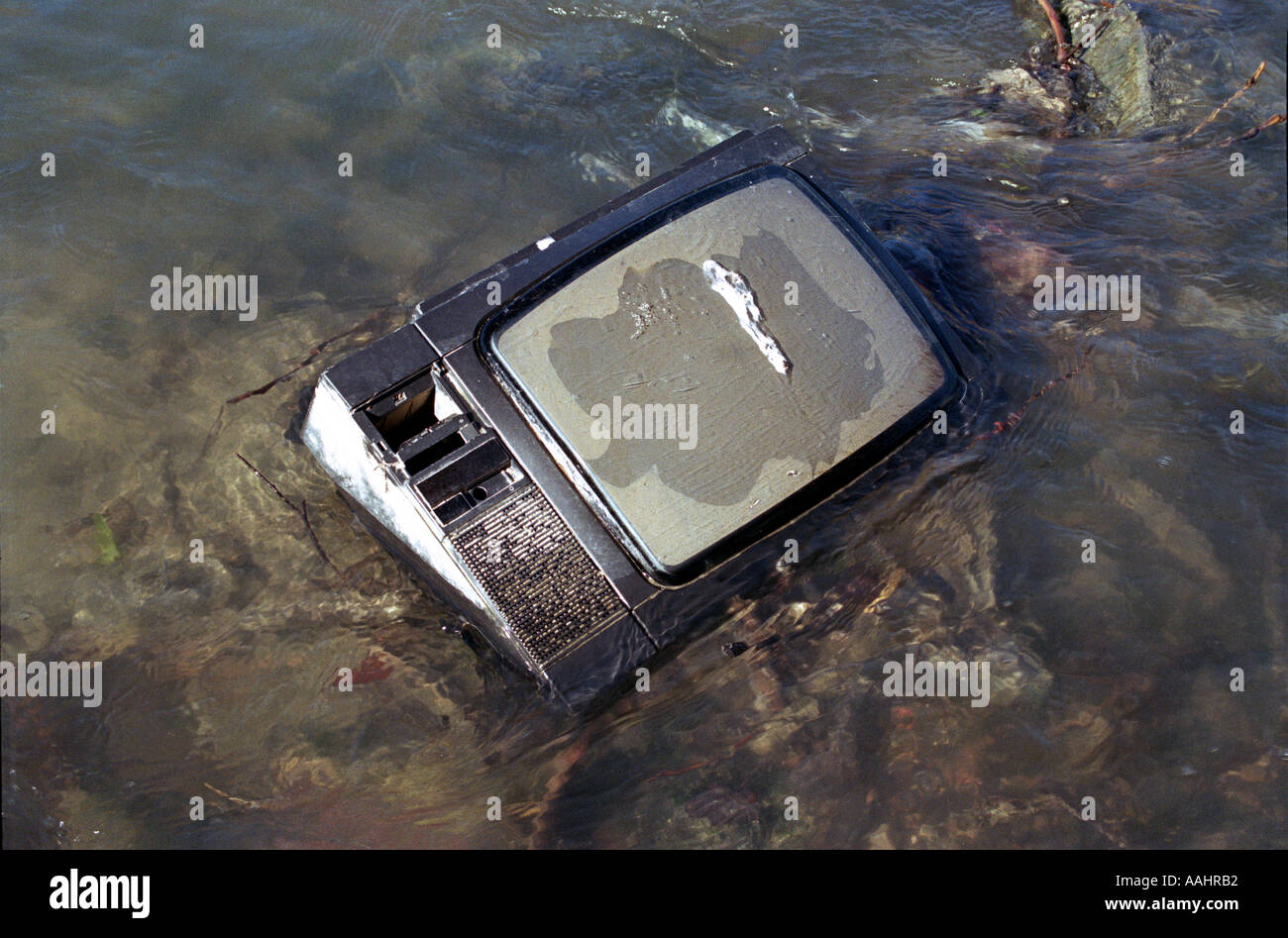 old tv dumped in river Stock Photo Alamy