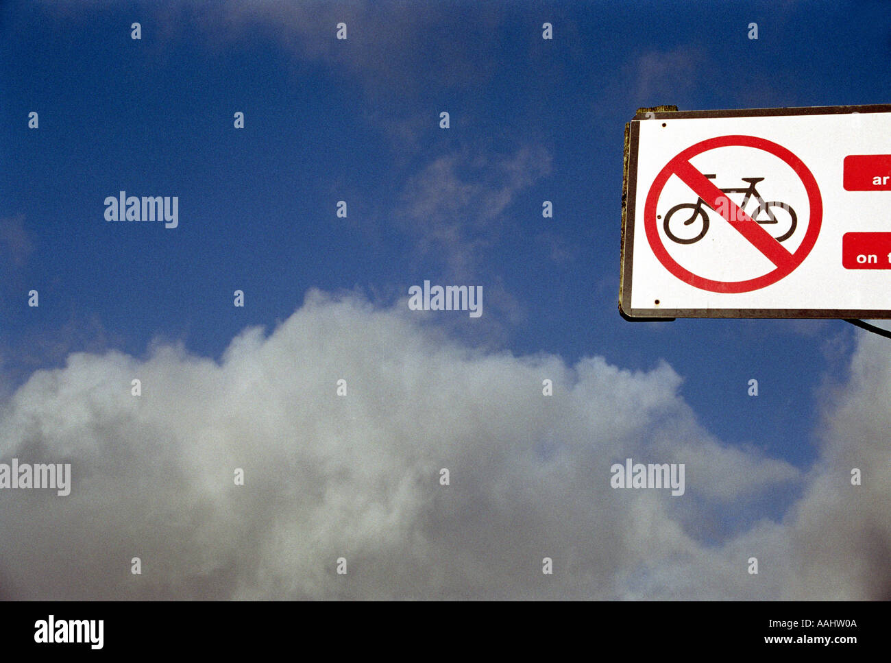 no cycling sign against sky  Stock Photo