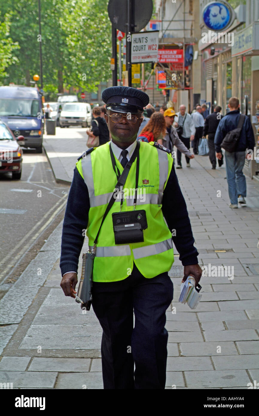 A City of Westminster London Parking control officer - traffic warden. Stock Photo
