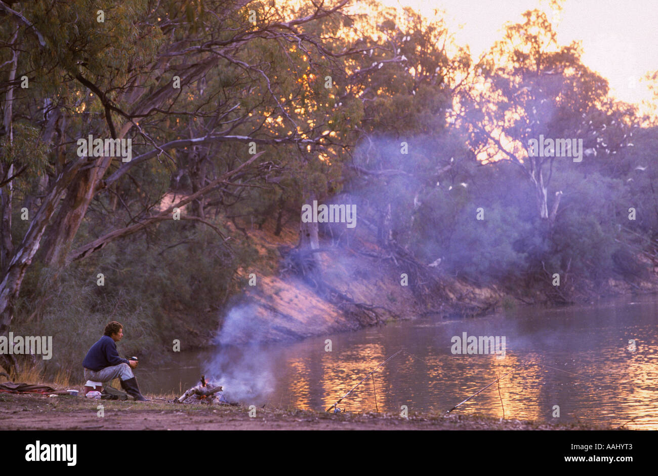 Campfire scene Murray Kulkyne National Park Murray Mallee NW Victoria Australia Horizontal Eucalyptus camaldulensis Stock Photo