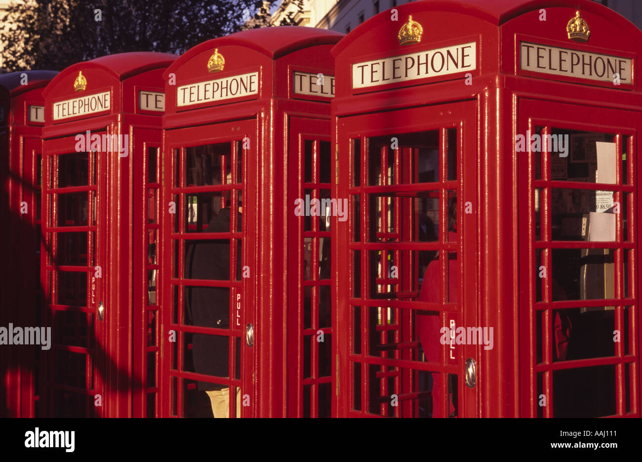 Four old style red telephone boxes, London. UK Stock Photo Alamy