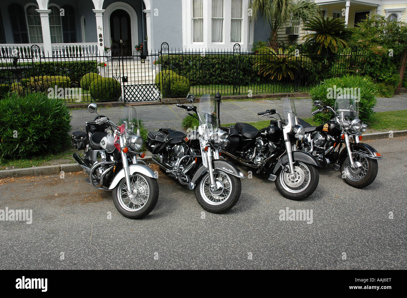motorcycles parked in front of homes along The Battery Charleston