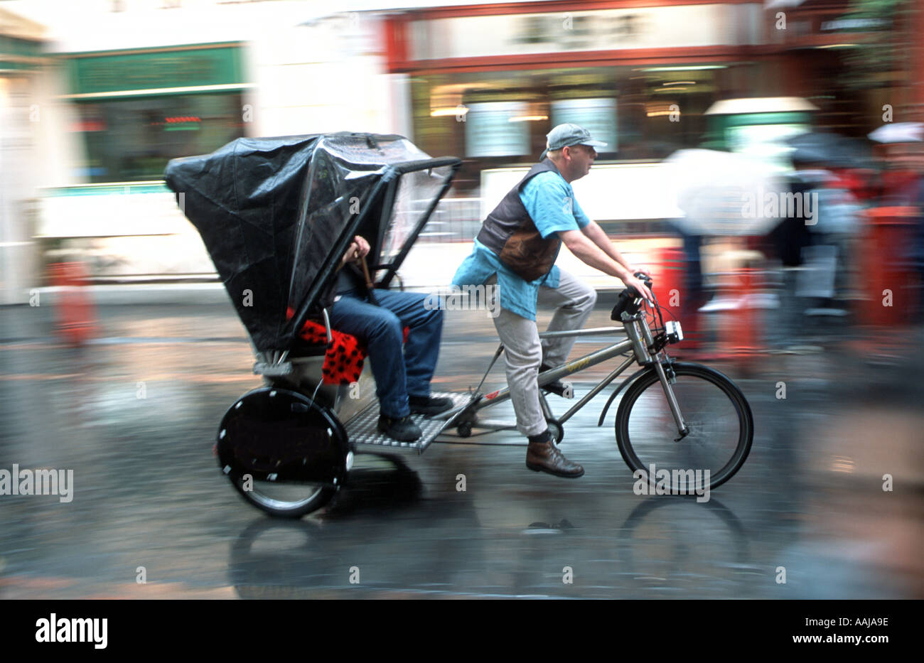 Rickshaw cycle in London Stock Photo