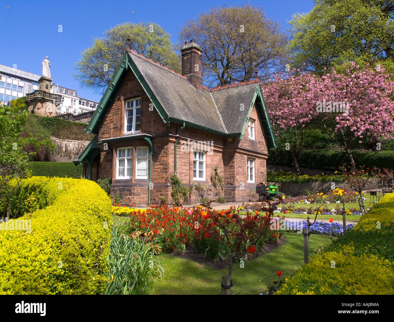 House and Spring flowers in Princess St.Gardens Edinburgh Scotland