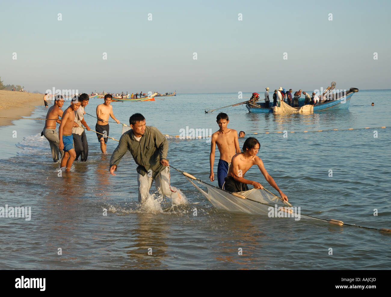 Thai Fishermen Netting Off The Malaysian Coast Pantai