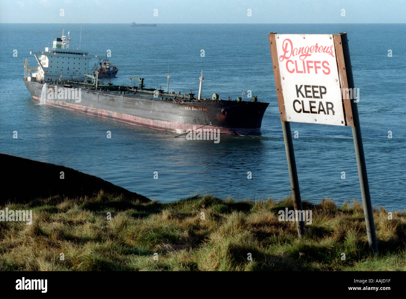 Oil tanker Sea Empress aground on rocks outside Milford Haven oil