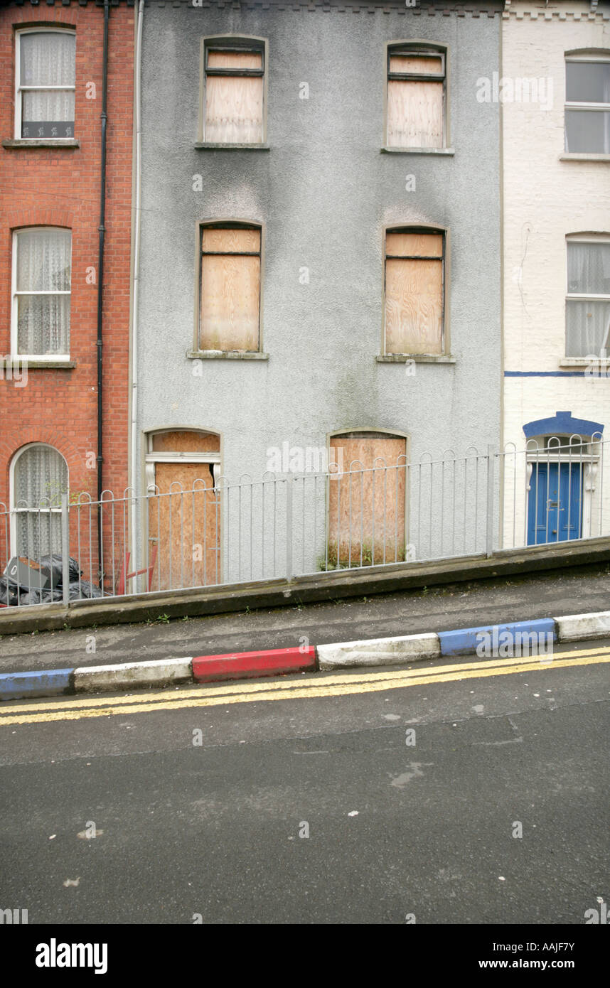 Boarded up housing in The Fountain estate, Londonderry, County Derry, Northern Ireland. Stock Photo