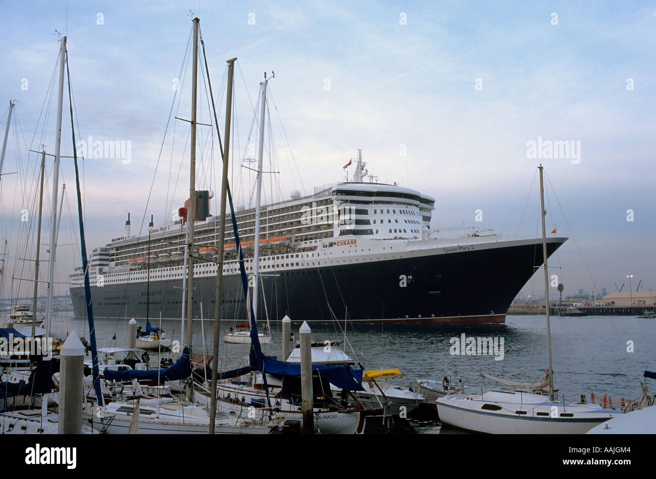 The Queen Mary 2 departing through the Main Channel in San Pedro harbor, Los Angeles, California Stock Photo