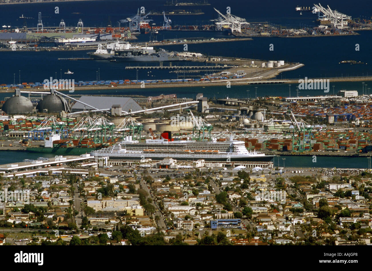 Amazing overview of the San Pedro harbor, Los Angeles, California while the Queen Mary 2 resides at berth 87 in the Main Channel Stock Photo