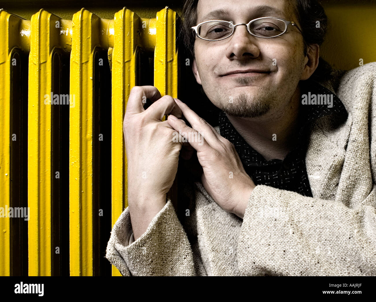 Hugging A Radiator Man heater hi-res stock photography and images - Alamy