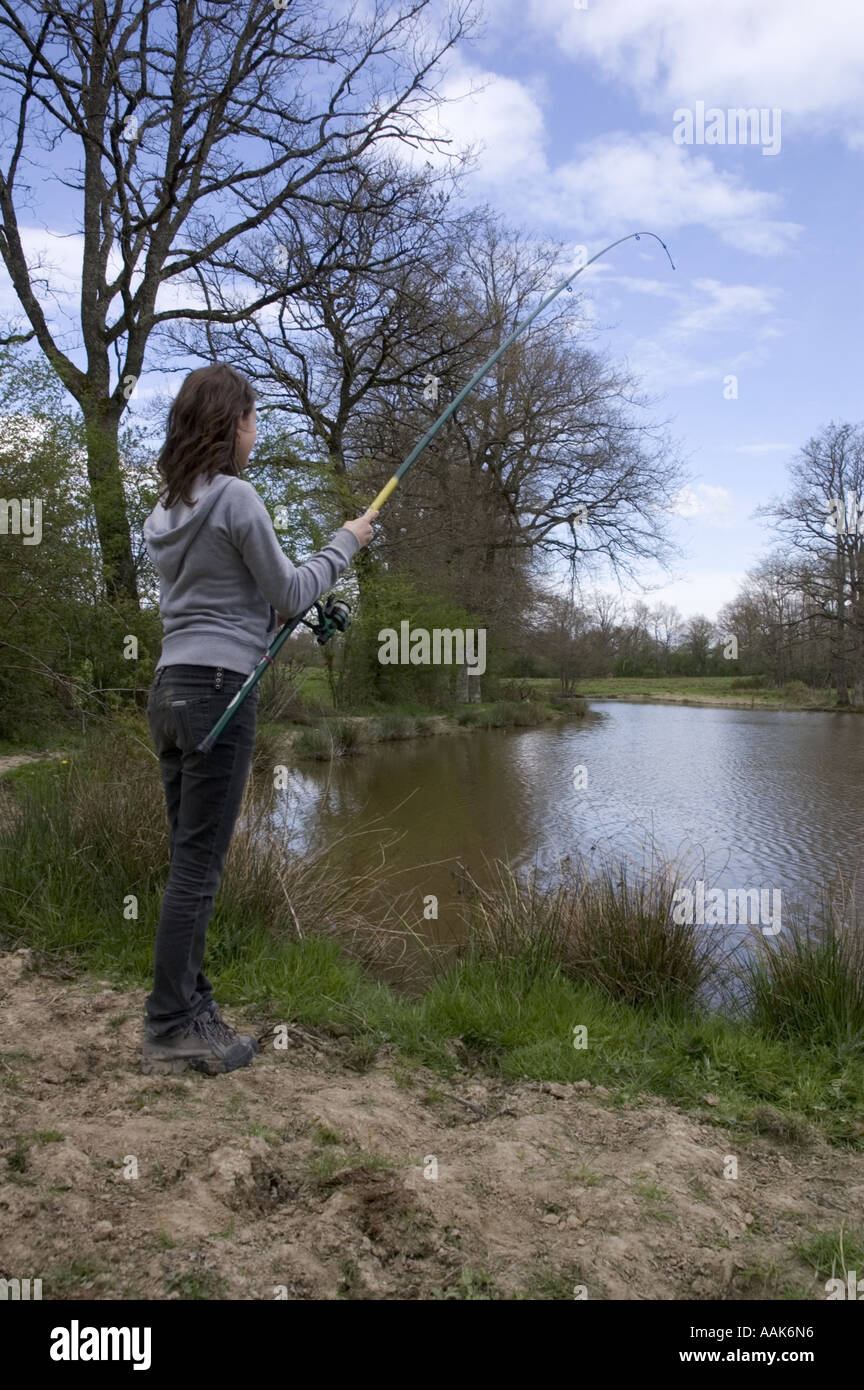 Teenage girl fishing hi-res stock photography and images - Alamy