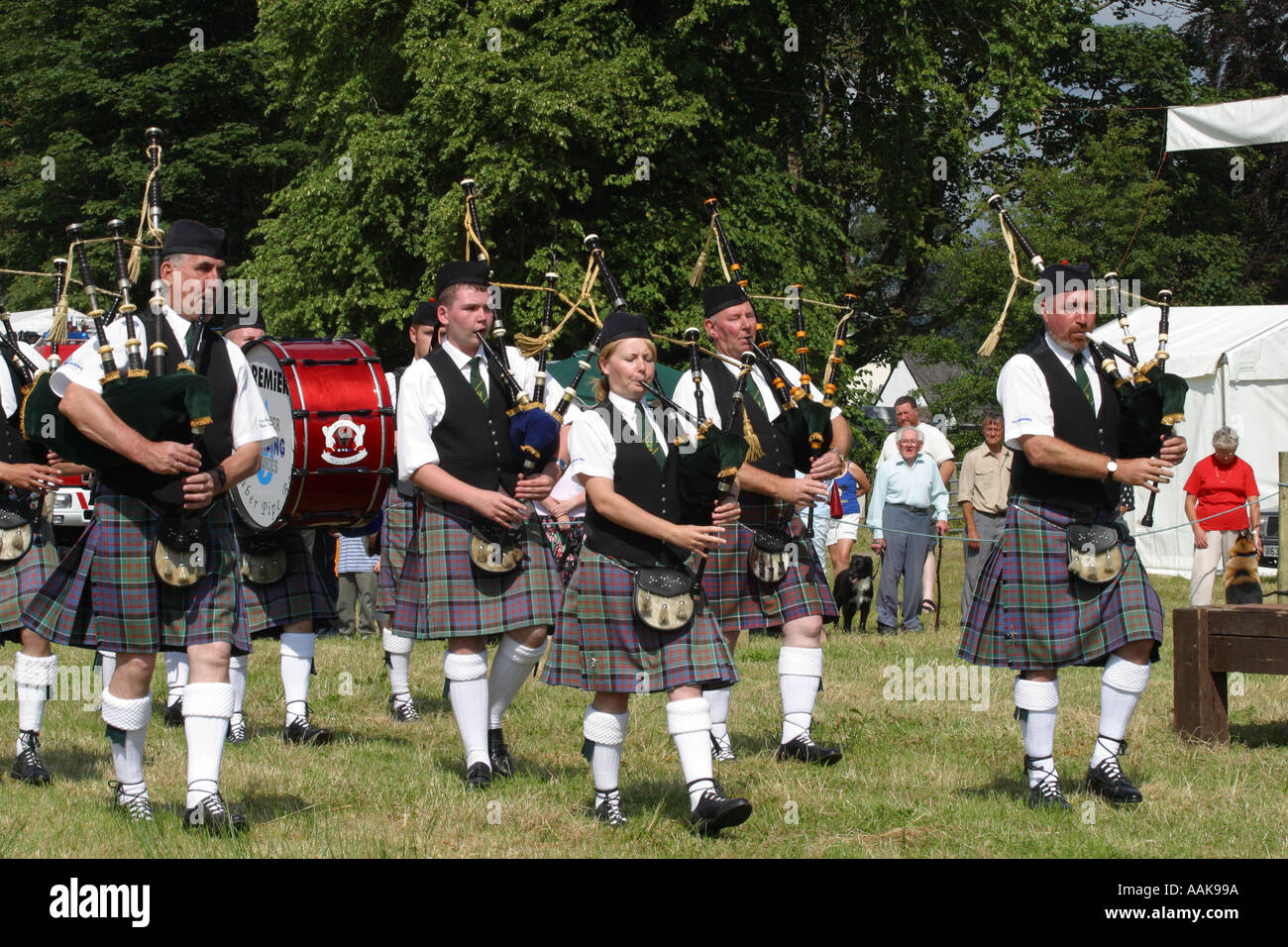 Scottish pipe band marching at Strontian local community highland summer show Stock Photo