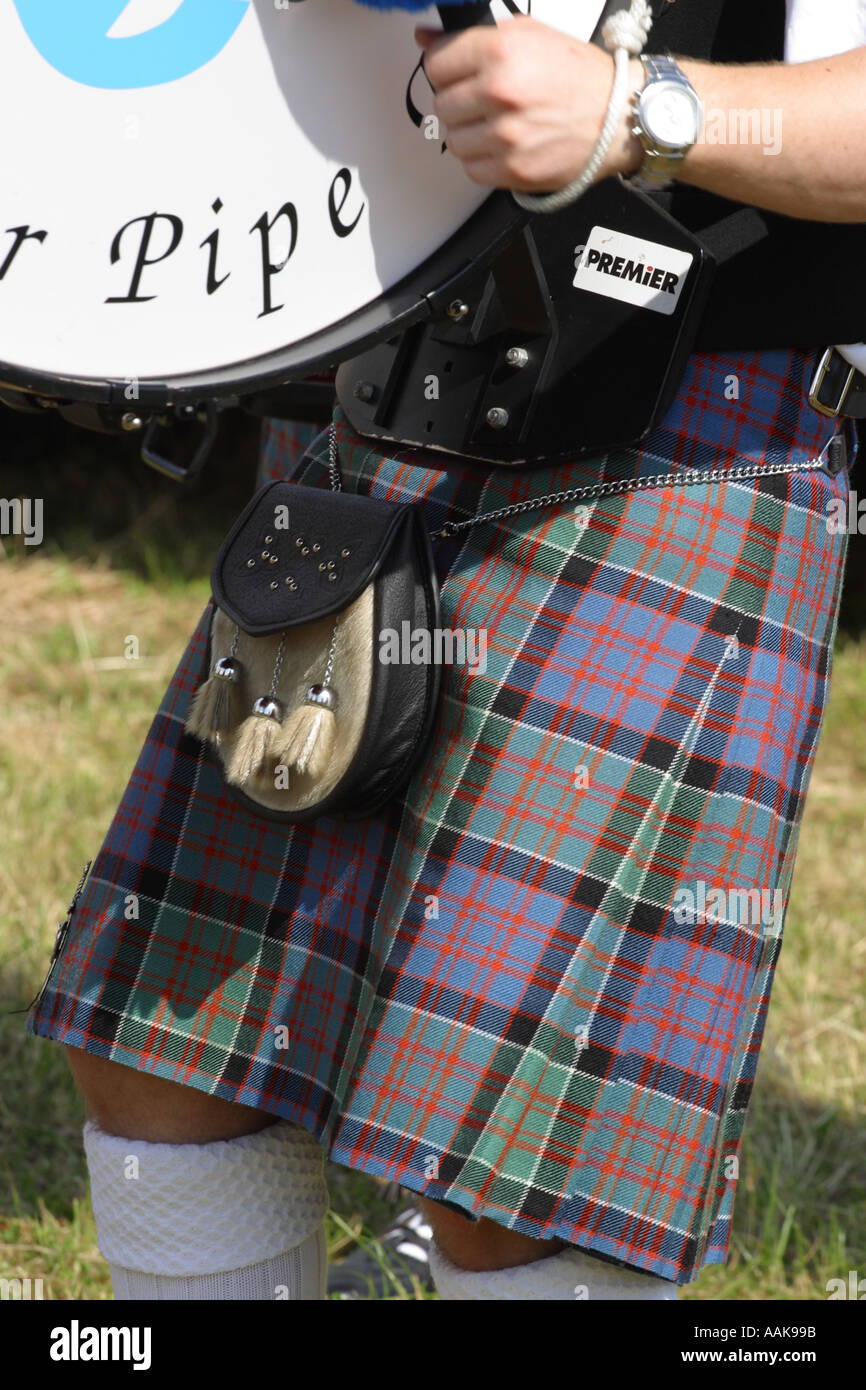 Drummer wearing Scottish tartan kilt and sporran member of a local Highland pipe band Stock Photo