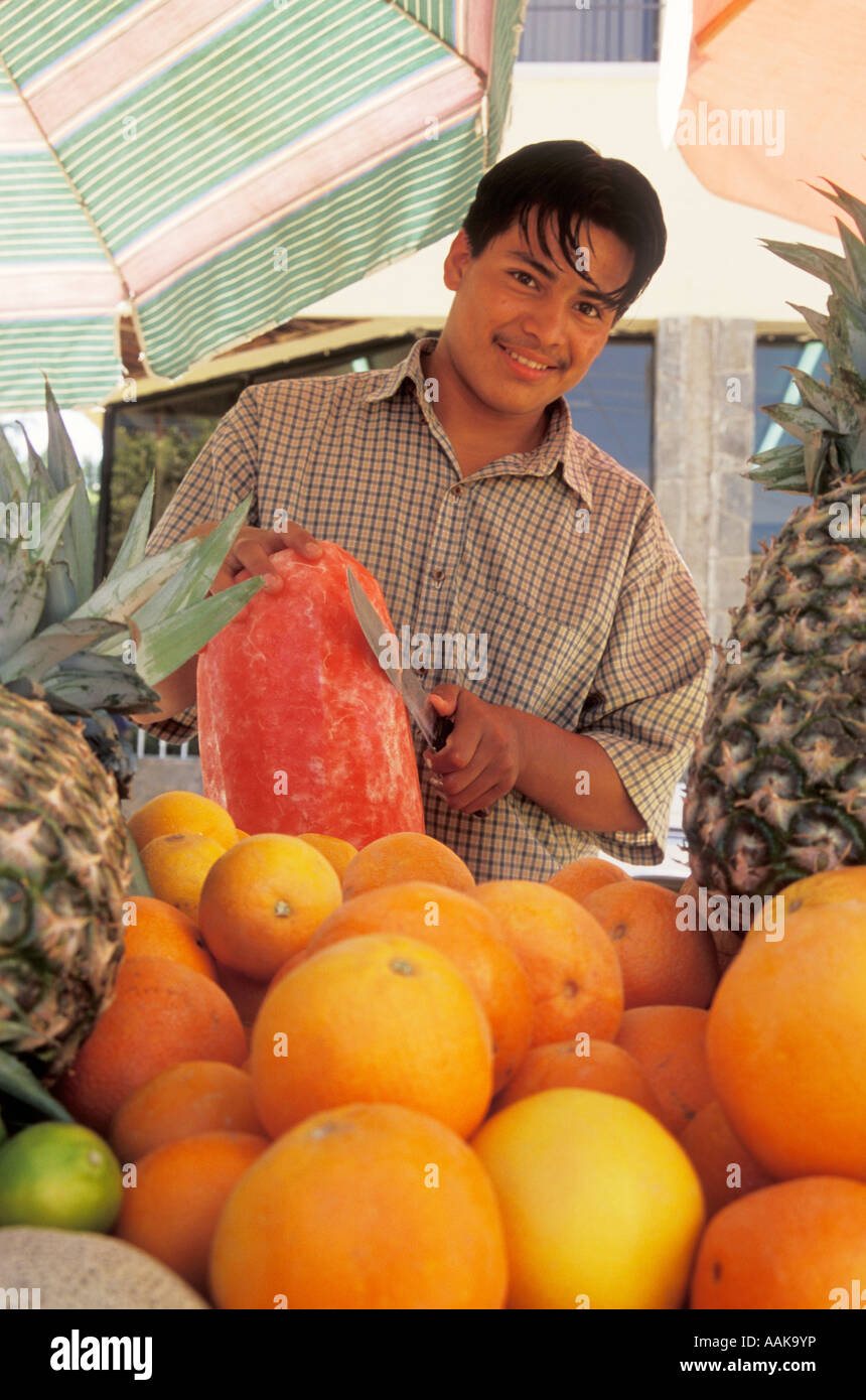 Street vendor with fruit cart in downtown Cabo San Lucas Baja