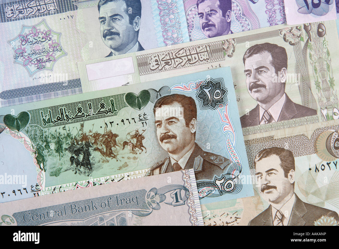 Various paper money Dinar notes from Iraq These bills are from the former regime run by the dictator Suddam Hussein Stock Photo
