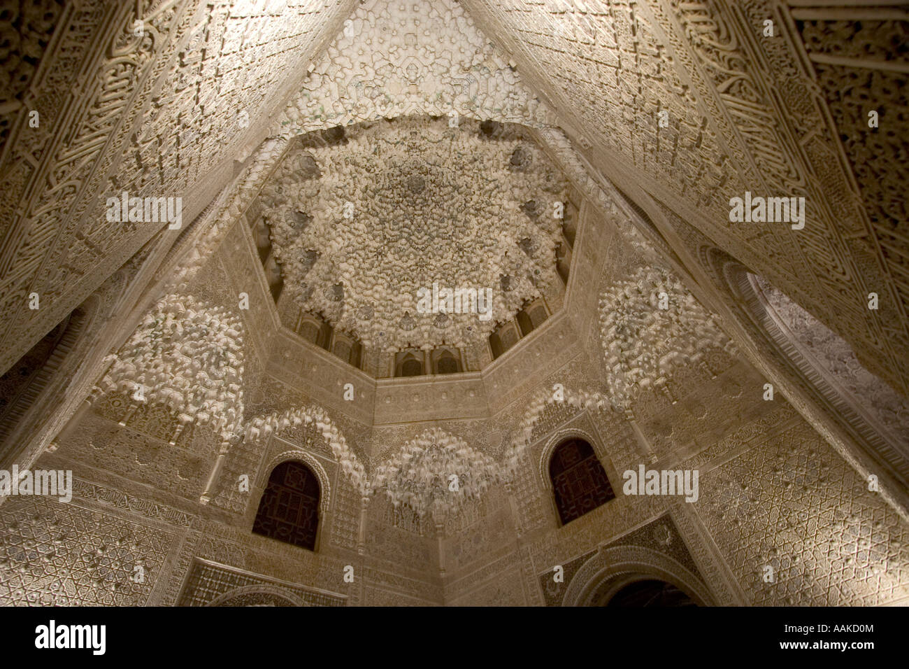 Intricately carved ceiling inside El Palacio Nazaríes La Alhambra Granada Spain Stock Photo