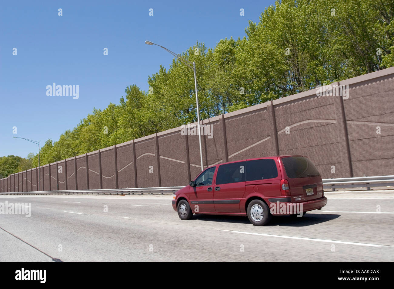 Highway sound barrier wall on the freeway Stock Photo Alamy