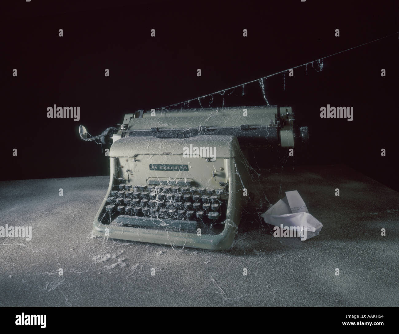 Old typewriter covered with cobwebs Stock Photo - Alamy