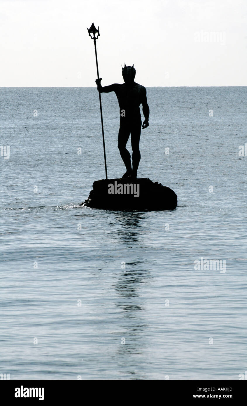 Statue of Neptune Poseidon located offshore Melenara Beach, in the city of Las Palmas capital of