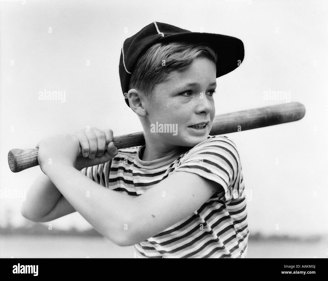 Boy wearing baseball cap Black and White Stock Photos & Images - Alamy