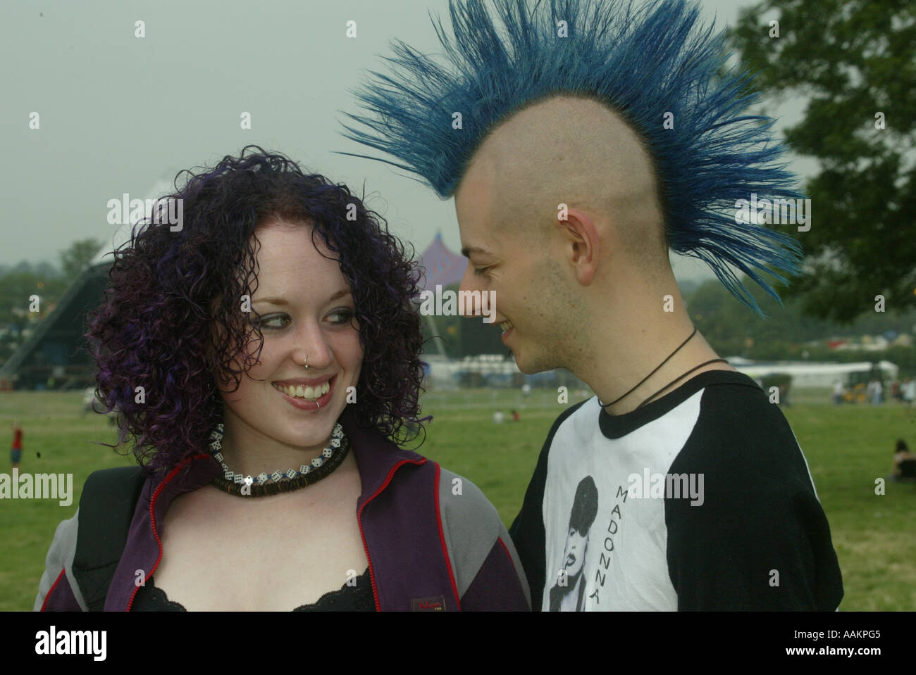 A punk rocker smiles at his girlfriend Stock Photo