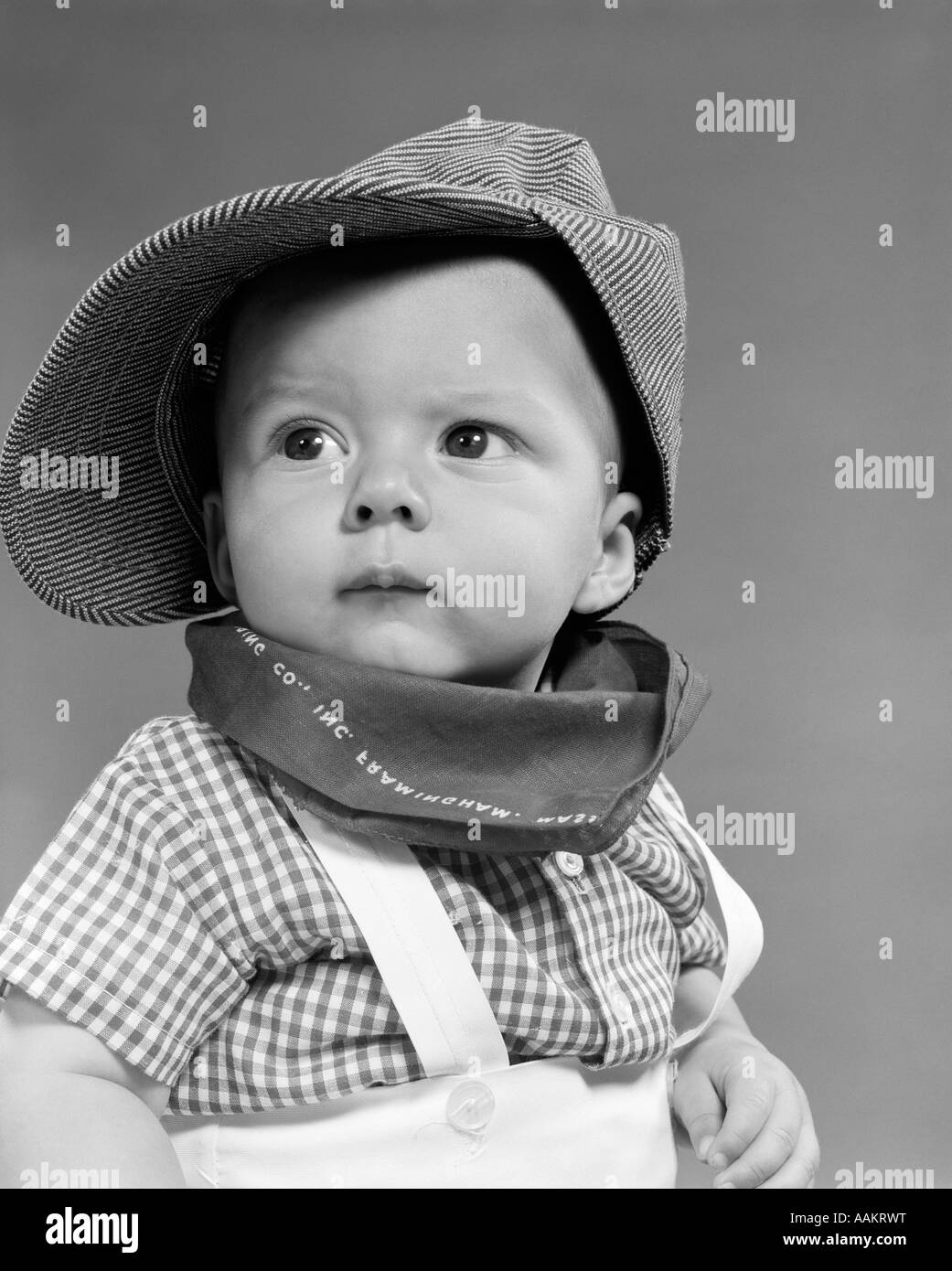 1950s BABY HEAD SHOULDERS WEARING RAILROAD ENGINEER HAT WITH KERCHIEF AT NECK AND CHECKED SHIRT Stock Photo Alamy
