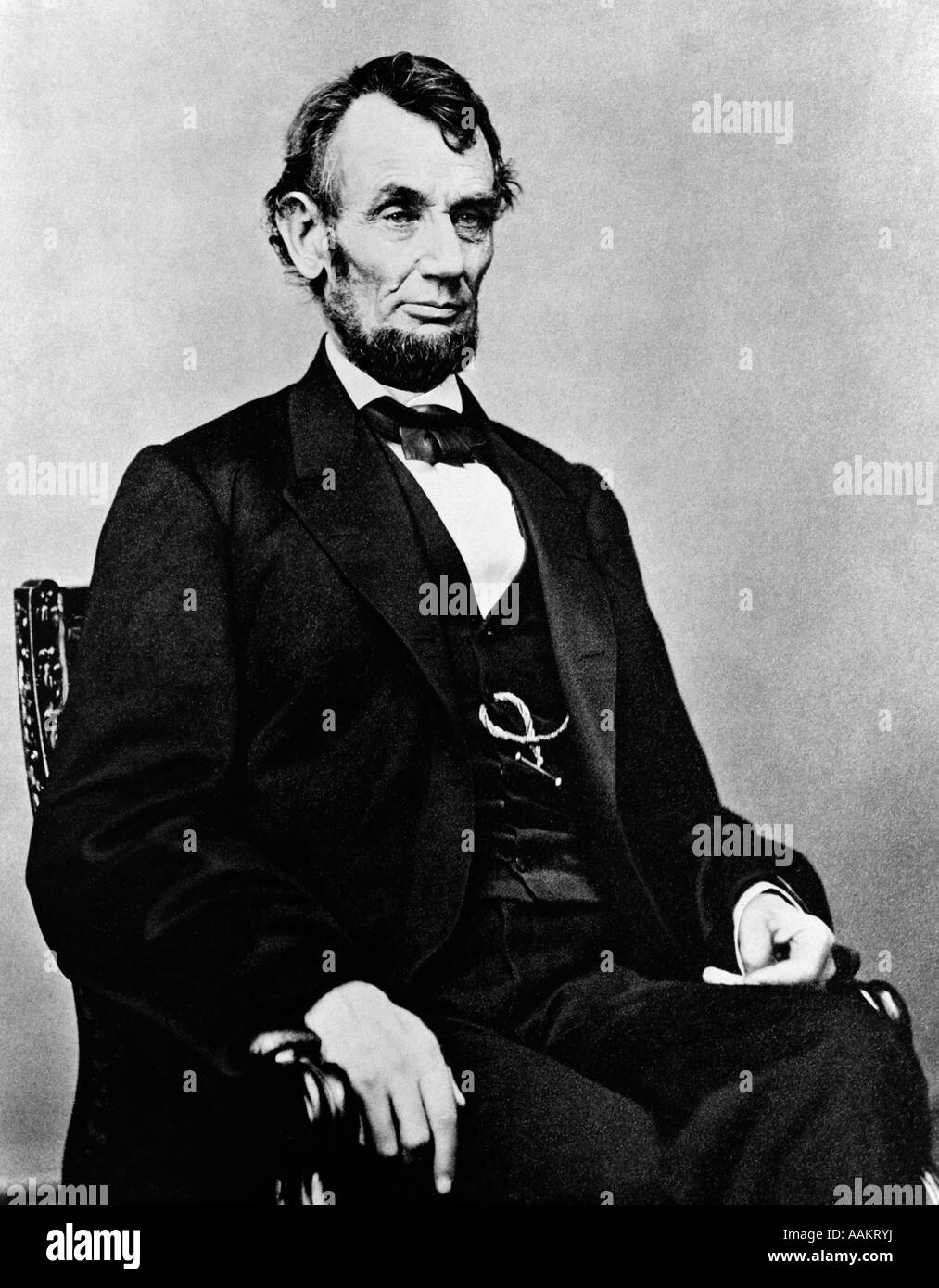 ABRAHAM LINCOLN 16TH PRESIDENT OF UNITED STATES DURING THE CIVIL WAR 1861 - 1865 SEATED PORTRAIT CIRCA 1864 Stock Photo